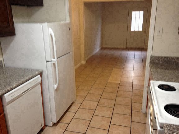 Kitchen from front window looking to den