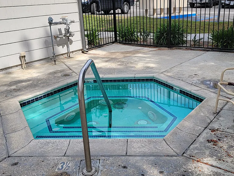 Spa in the pool area at Dove Ridge Apartments.