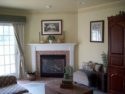 Family room w/ gas fireplc & tumbled marble surround