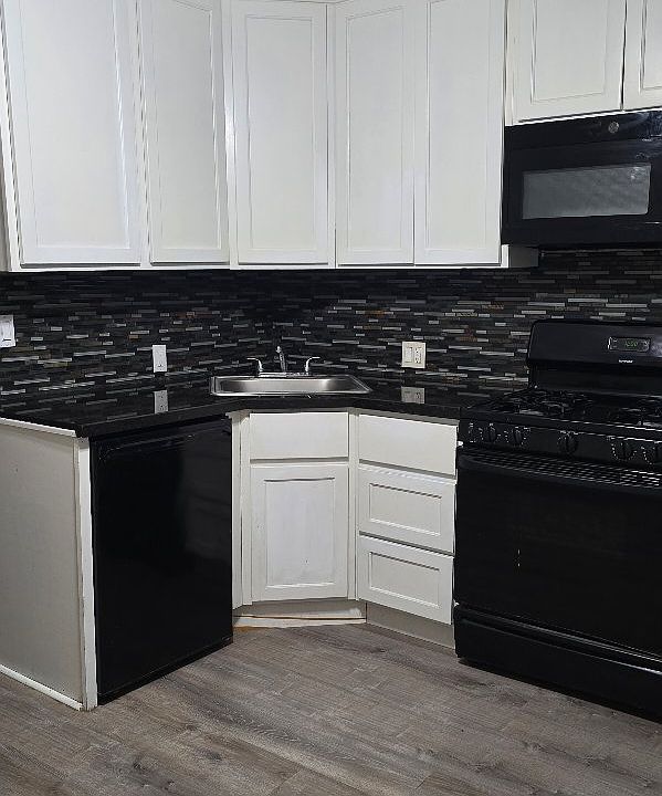 Kitchen/living combo Over stove microwave mini fridge