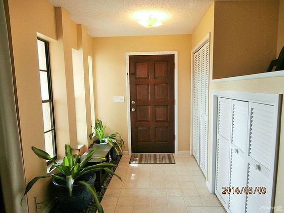 Beautiful Wooden Door, Tiled Foyer