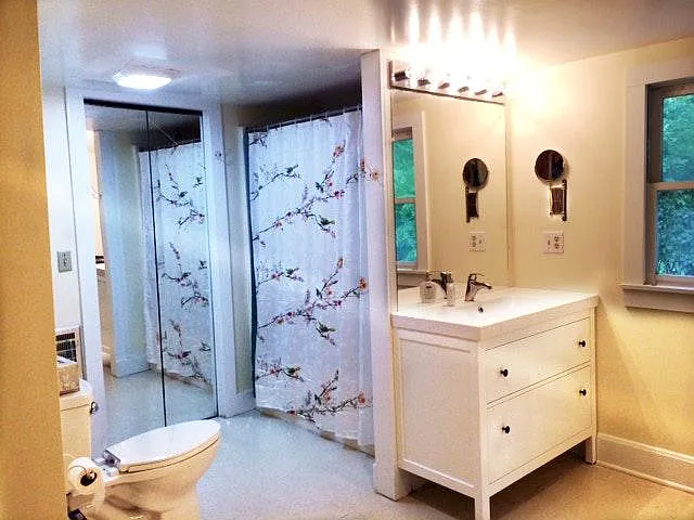The bath is a Jack and Jill-style connecting both of the ups