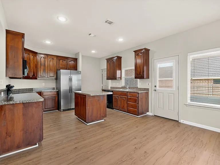 7516 Red Stag St — Photo 4