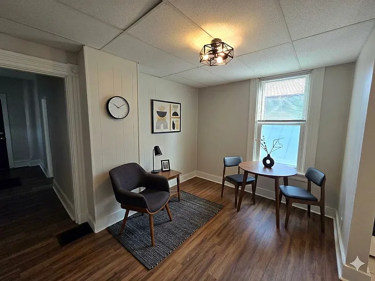 Living room / dining room (virtual staging)