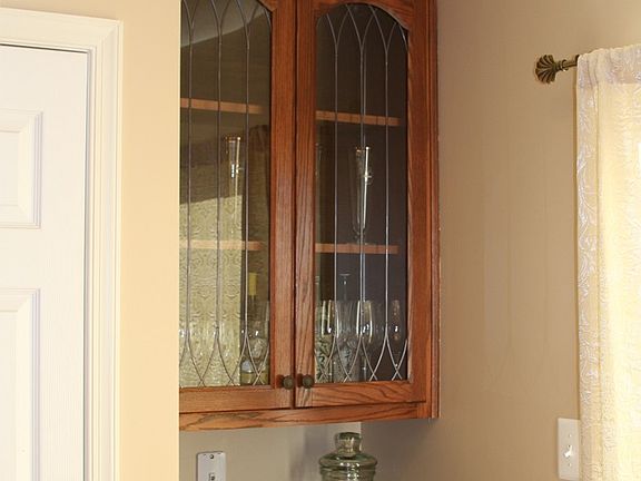 bar area in the kitchen next to pantry