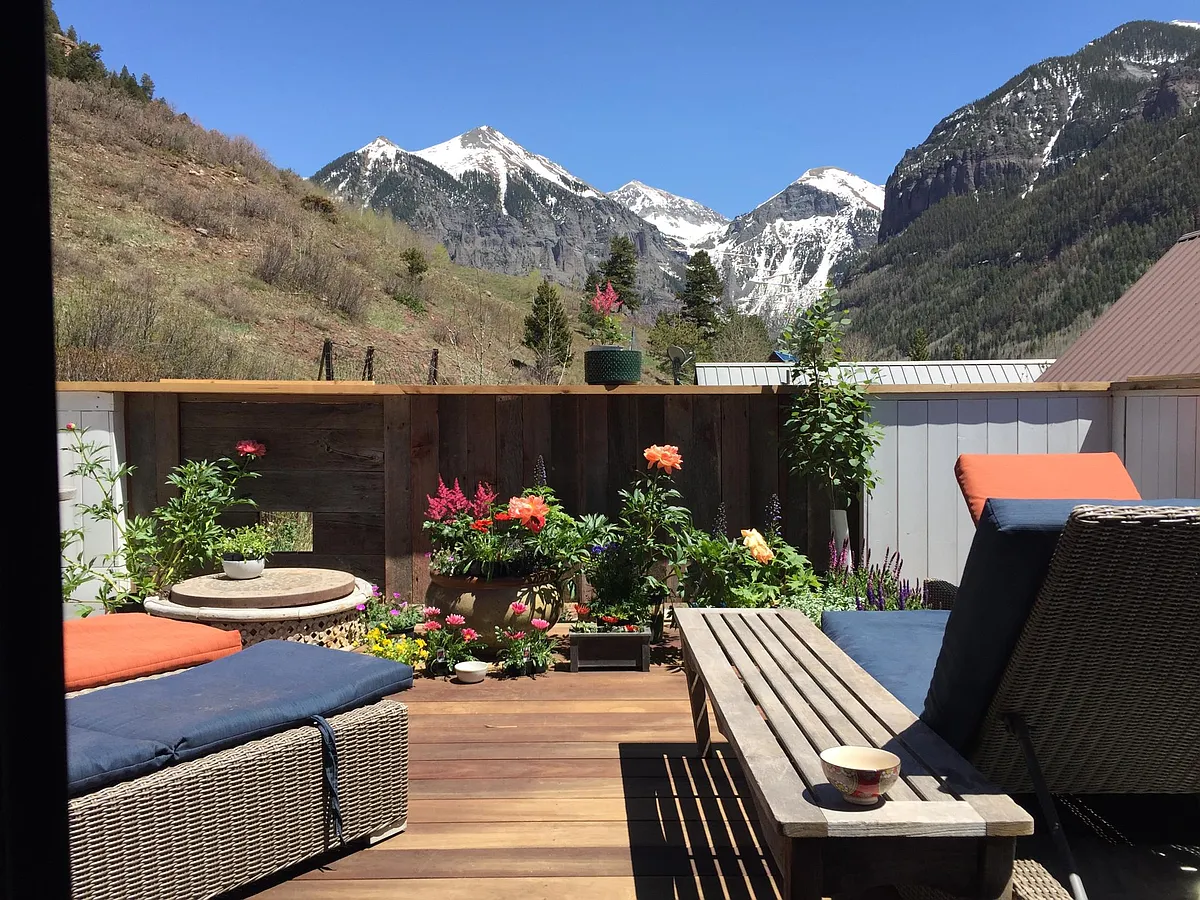 Large Deck with brand new grill, four lounge chairs and a picnic table. - 316 N Willow St