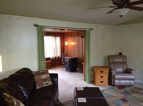 Living Room opens to Sunroom