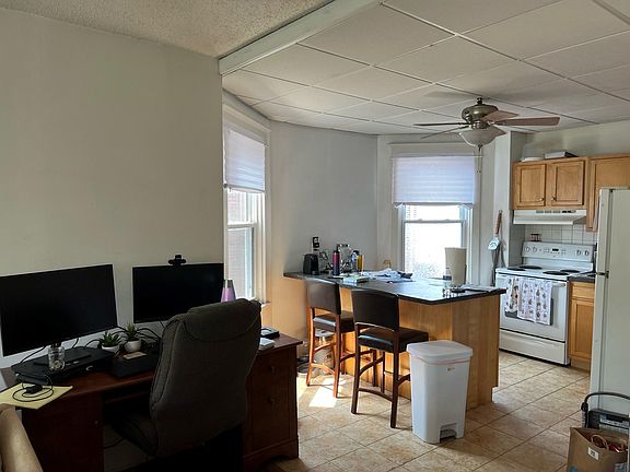 Living room leading into Kitchen