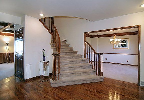 Beautiful entry with hardwood floors.