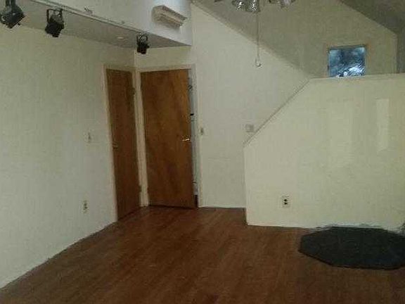 Living Room leading to loft area