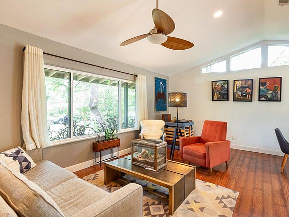 big windows, ceiling fans throughout