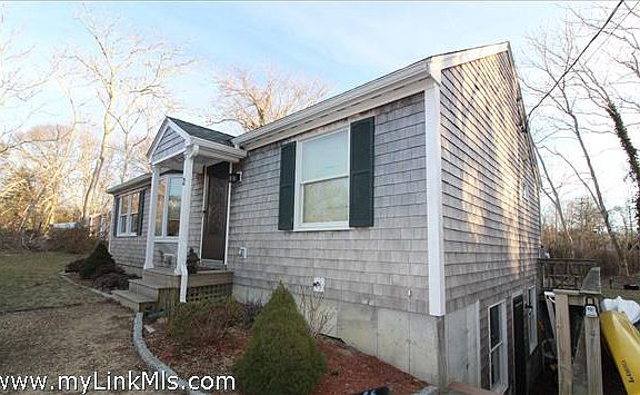 Exterior with walk-out basement entrance