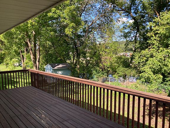 Deck overlooking river and backyard