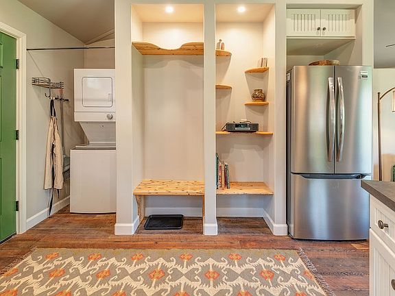 Laundry, boot-bench and tray, coat hangers and knick knack storage in entryway
