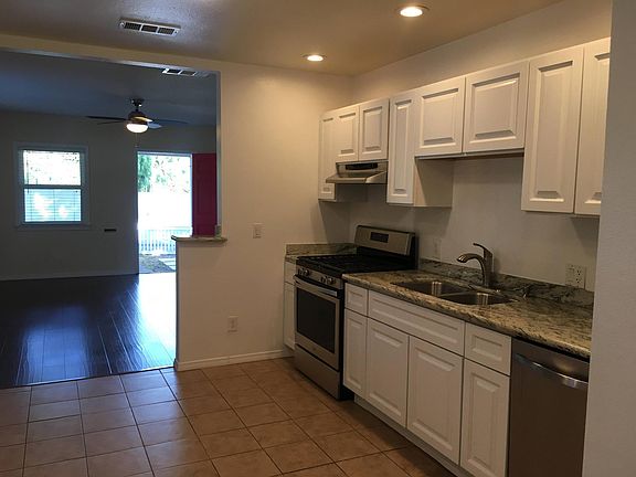 Kitchen: facing living room & front door