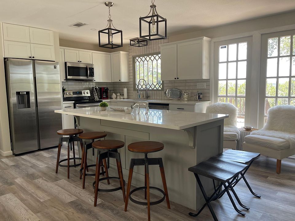 Newly-renovated, fully equipped kitchen. Includes cooking utensils/pots/pans