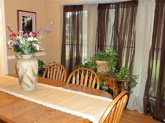 Located off the foyer, dining makes perfect in-home office.