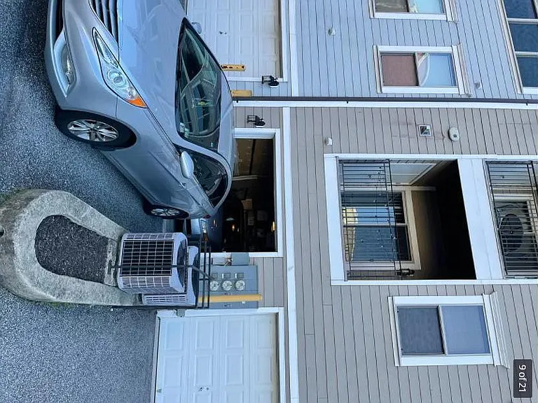 One Parking pad and one private garage parking space