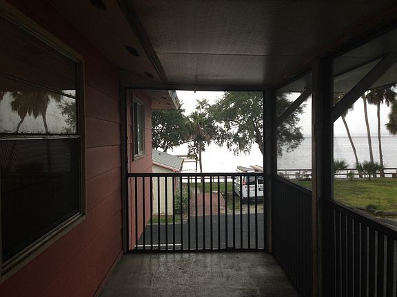 Screened porch with water view