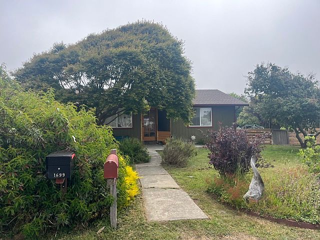 Home in McKinleyville for rent. This humble home shares a large lot with a newer, smaller home. This home has a detached garage and a park-like setting with mature shrubs and trees.