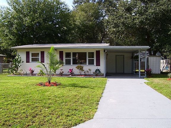 front view-extra long driveway and large yard