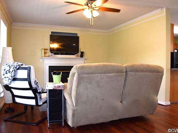 Laminated floor through the first level. Open floor configur