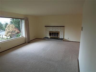 Lots natural light and territorial views from this living room. Snuggle up to 