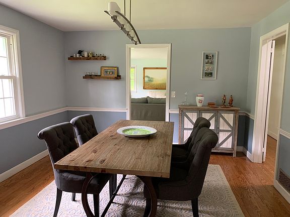 Dining Room open to Living Room and Kitchen. Hardwood Floors.