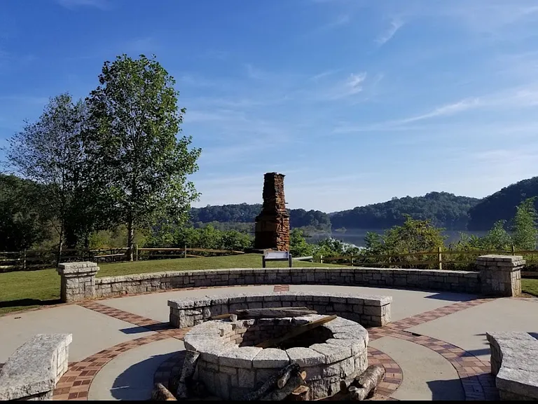 Morgan Falls Park firepit with Lake view a large greenfield great for a romantic picnic, play with kids or dogs.