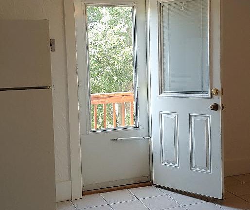 Kitchen to door over looking pond