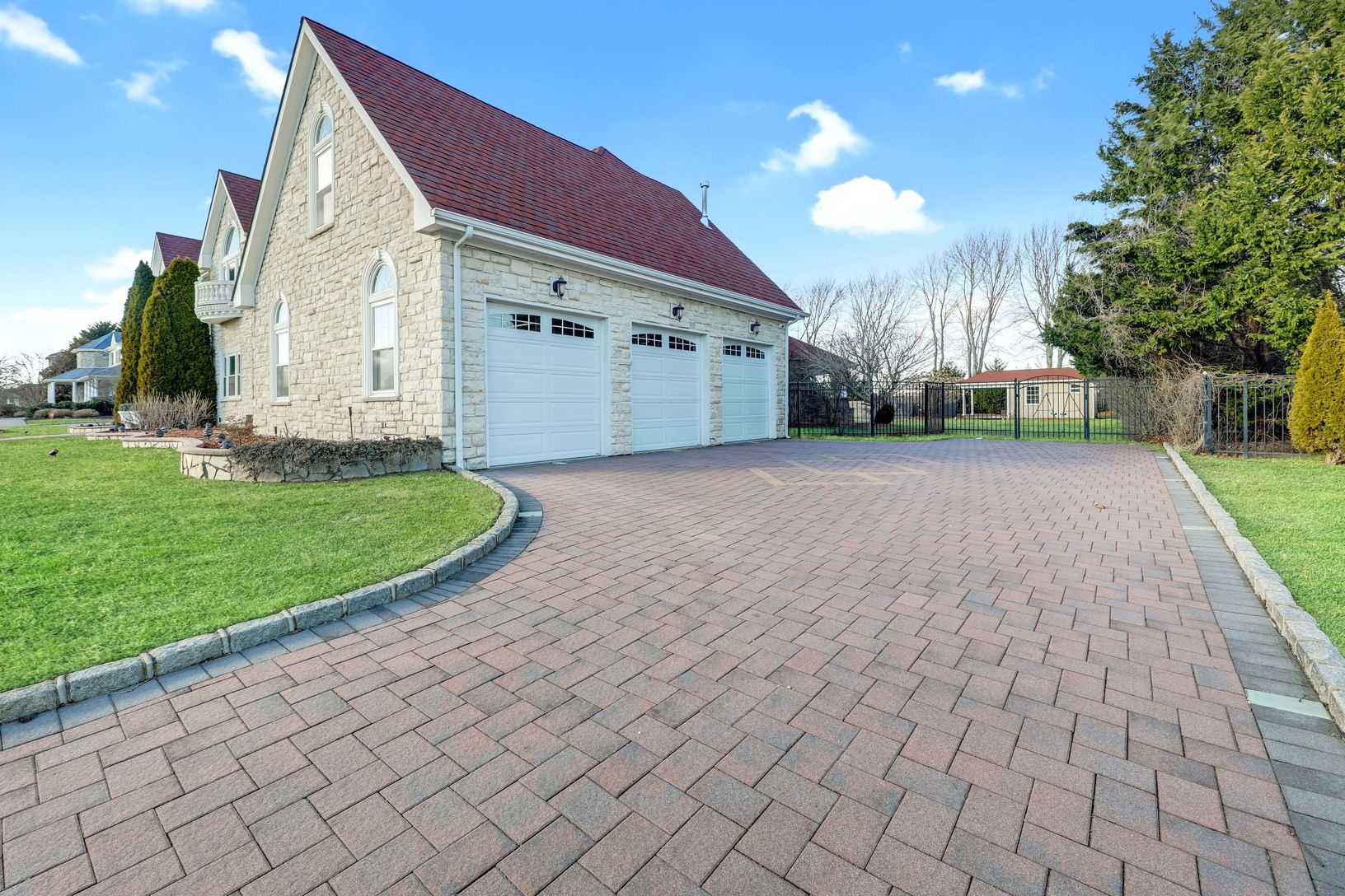  3-Car Attached Garage w/Paver Driveway