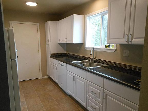 Kitchen with door to garage