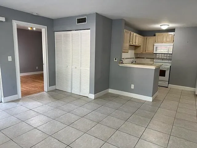1865 Palm Cove Blvd #9-106 — Photo 1