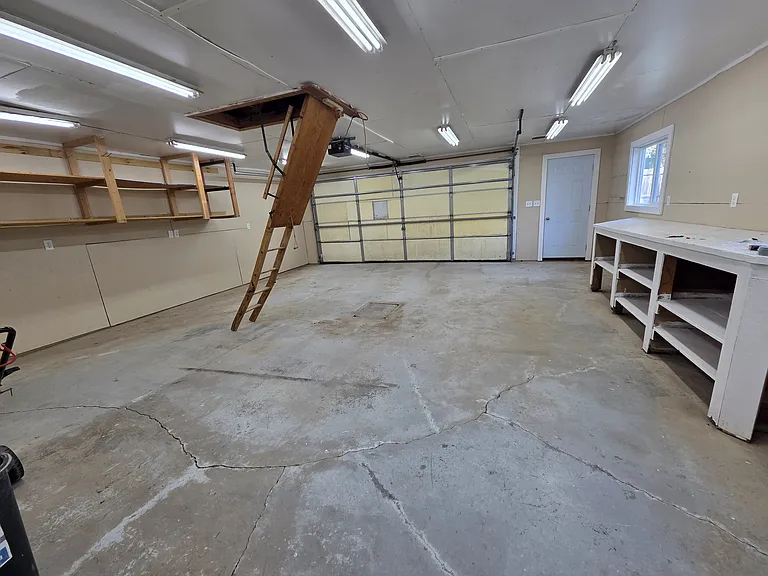 Lots of garage & shop space