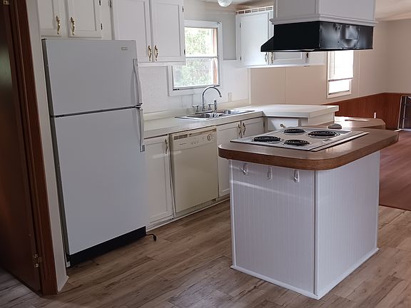 new Kitchen flooring, Refrigerator, and counter top