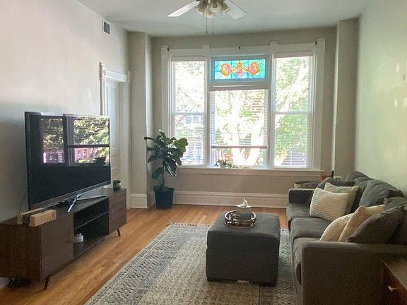 Living Room with original stained glass windows