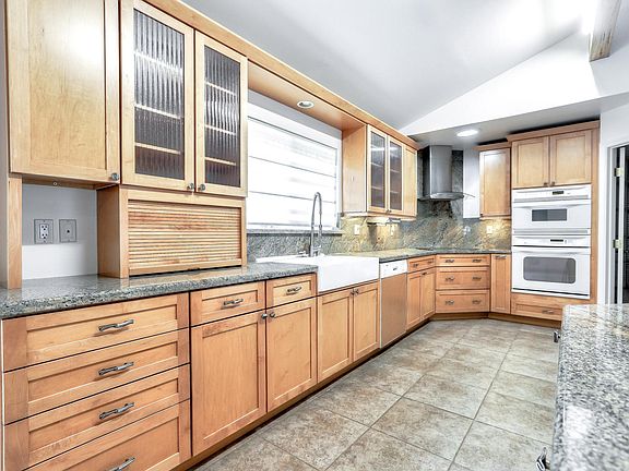 Modern Gourmet Kitchen with granite counters, and appliance garage.