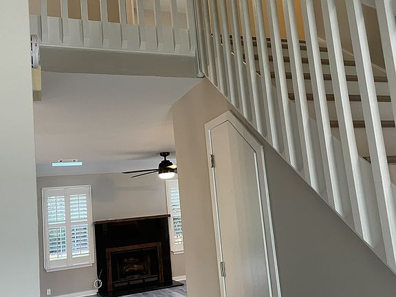 Looking into the family room and a view of the upstairs.