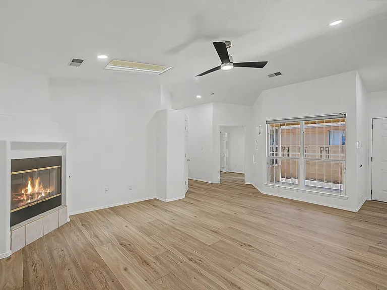 Living room with view looking towards bedroom and/or possible office space.