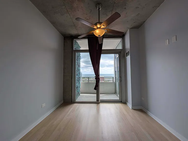 Main bedroom with balcony