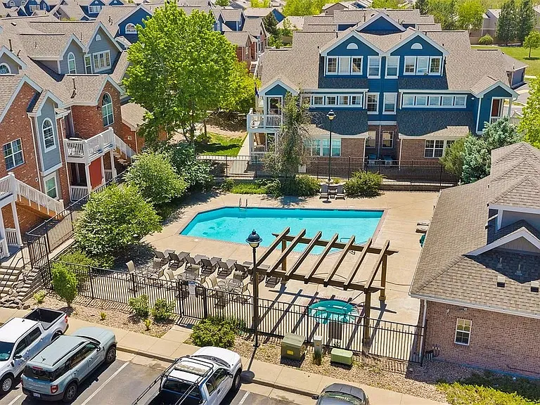 Pool is next to building