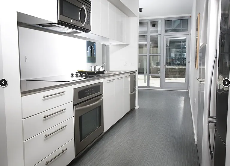 Kitchen of Alta Floorplan with stainless steel appliances