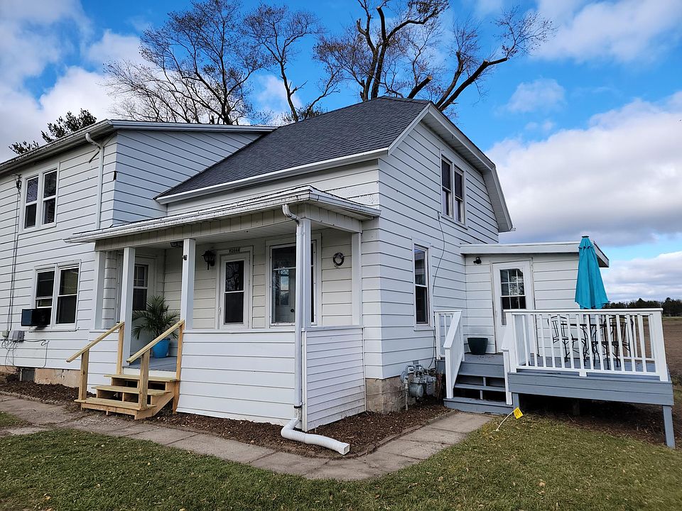 Front of apartment. Entrance and deck.