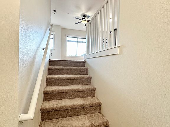 Stair to the first floor toward living room and kitchen