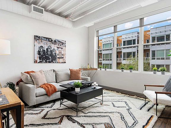Our pet-friendly 1- and 2-bedroom industrial inspired lofts feature 9-foot, 4-inch ceilings with exposed structure and ductwork.