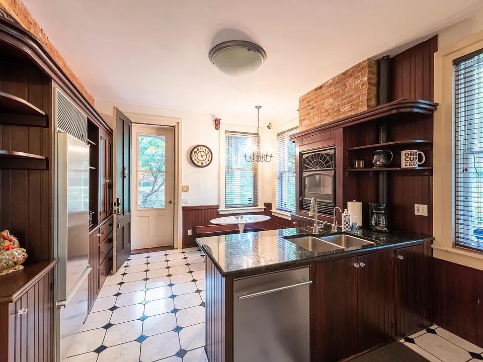 Professional kitchen with Wolf stove, Sub Zero refrigerator, fireplace and heated floors.