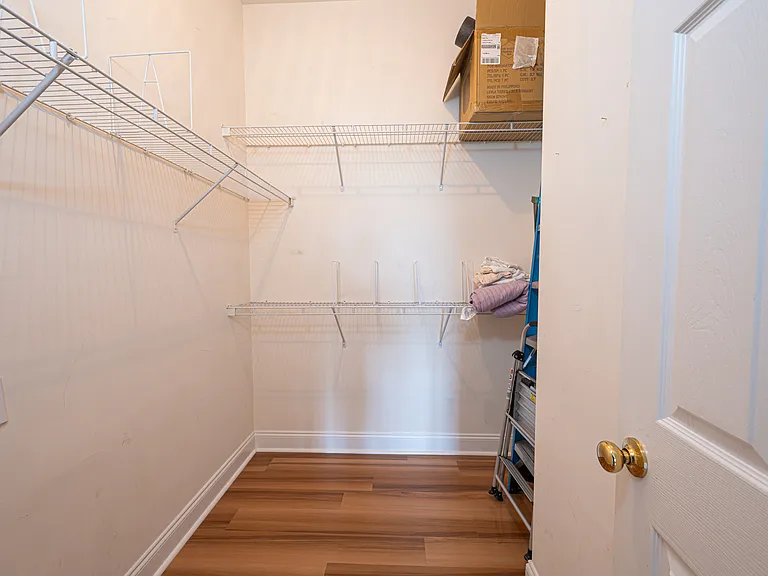 Walk in closet accessible via the master bedroom