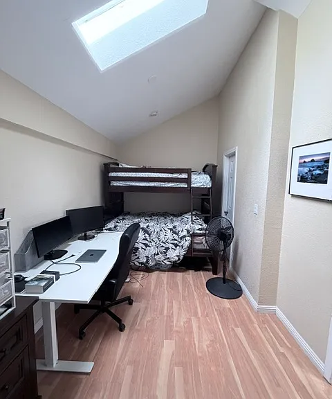 Kids bedroom upstairs with skylight