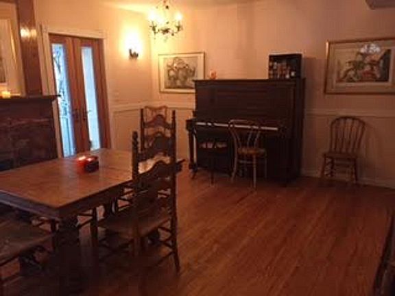 Front area room with piano.  