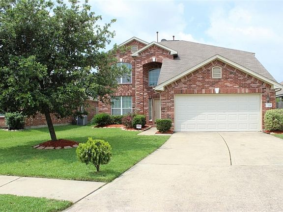 Full double wide driveway and new garage door.